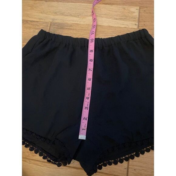Brandy Melville, women's black elastic waist shorts with fringe hem - Picture 8 of 8